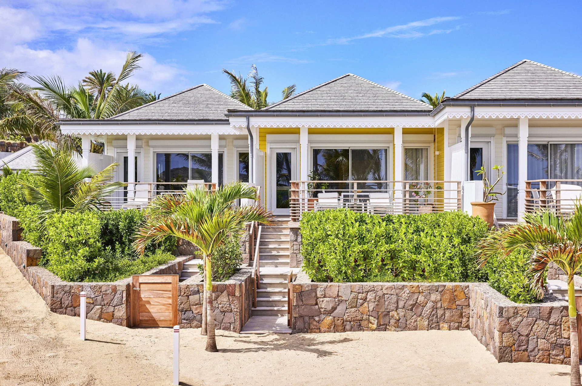 Beach Room exterior with terraces and beach at Rosewood Le Guanahani St Barth.