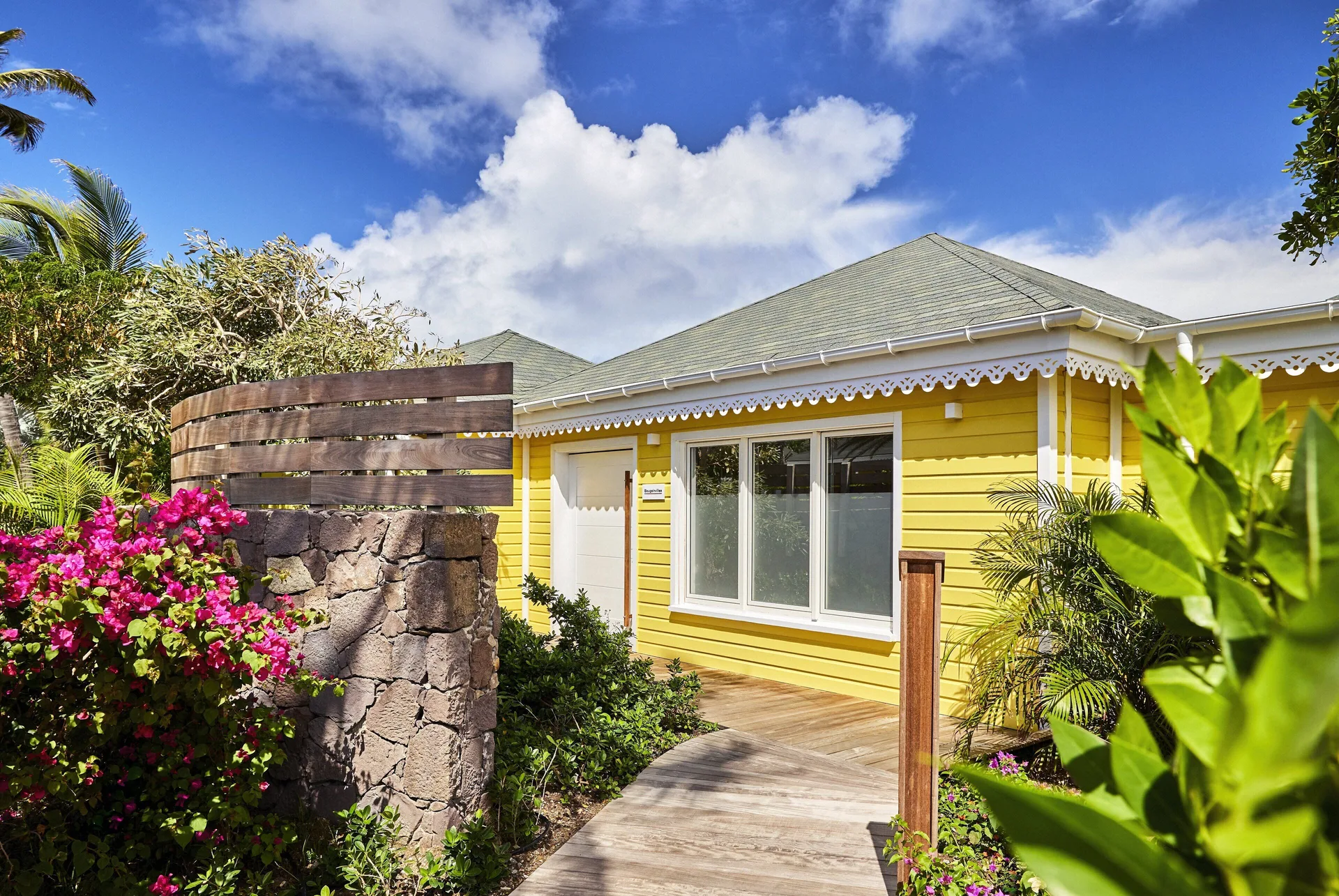 Bougainvillea Suite yellow exterior and garden at Rosewood Le Guanahani St Barth.