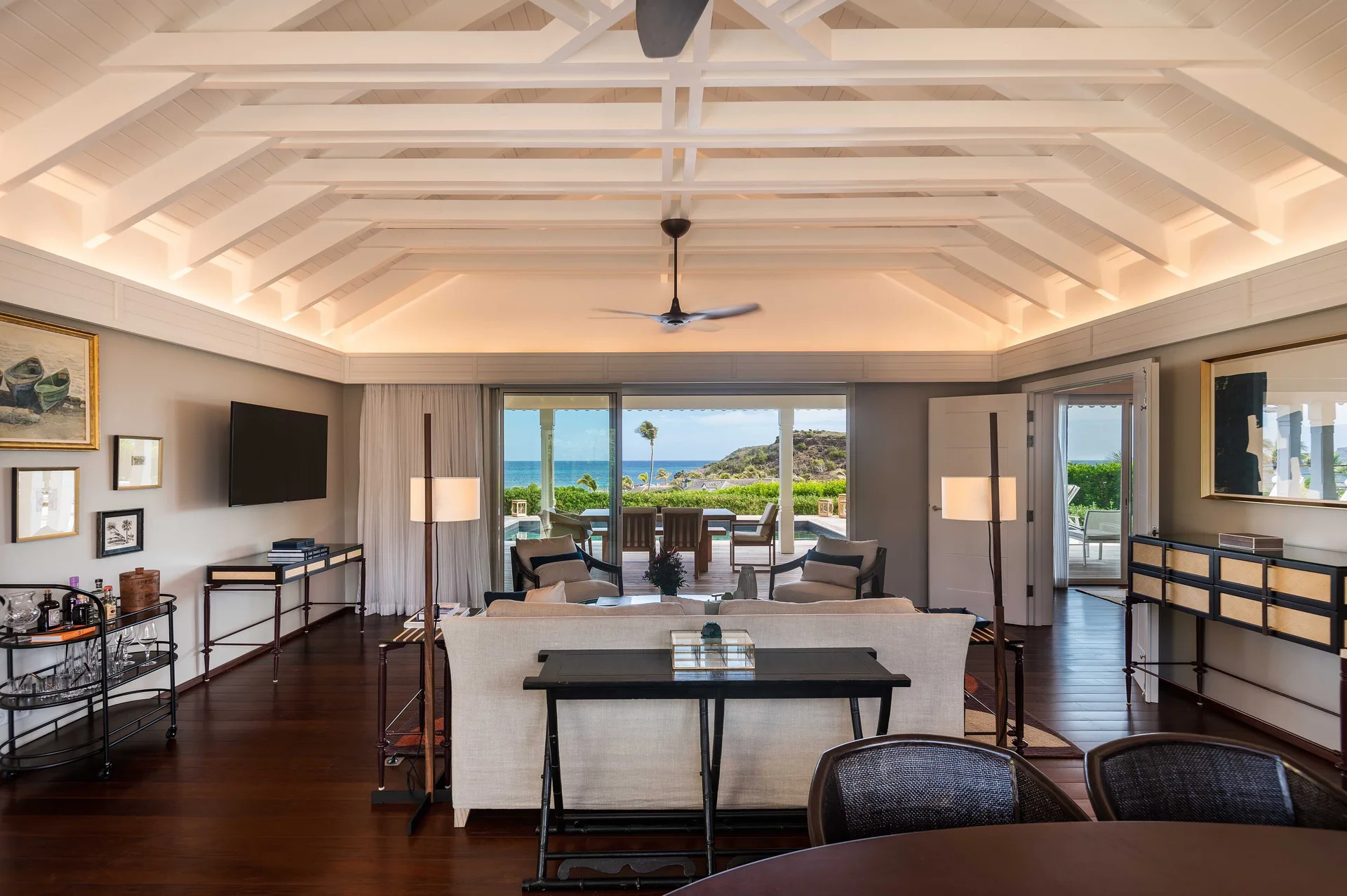 Bougainvillea Suite living and dining area facing the ocean at Rosewood Le Guanahani St Barth.