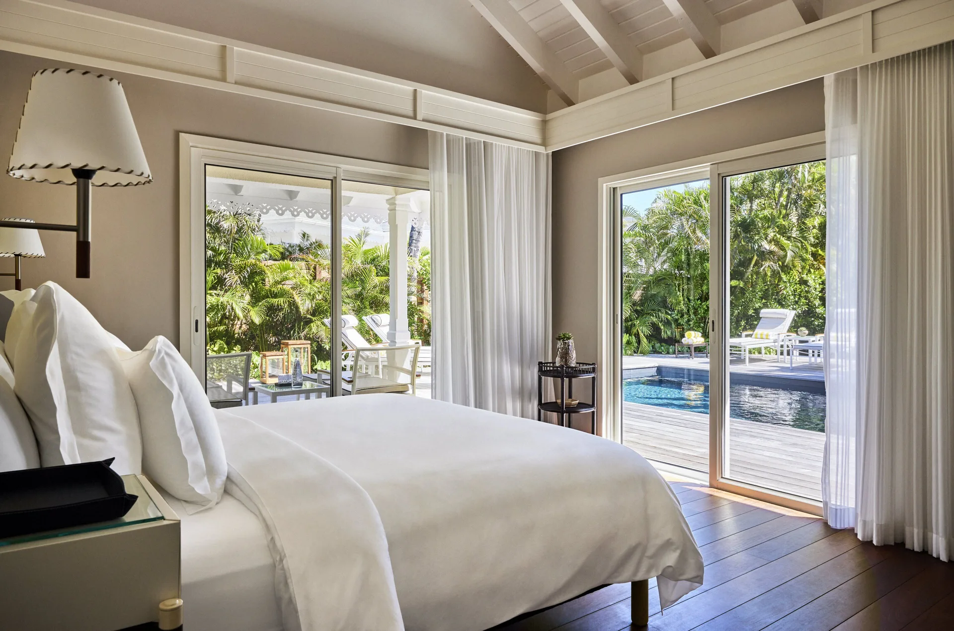 Garden House bedroom with king bed and pool view at Rosewood Le Guanahani St Barth.
