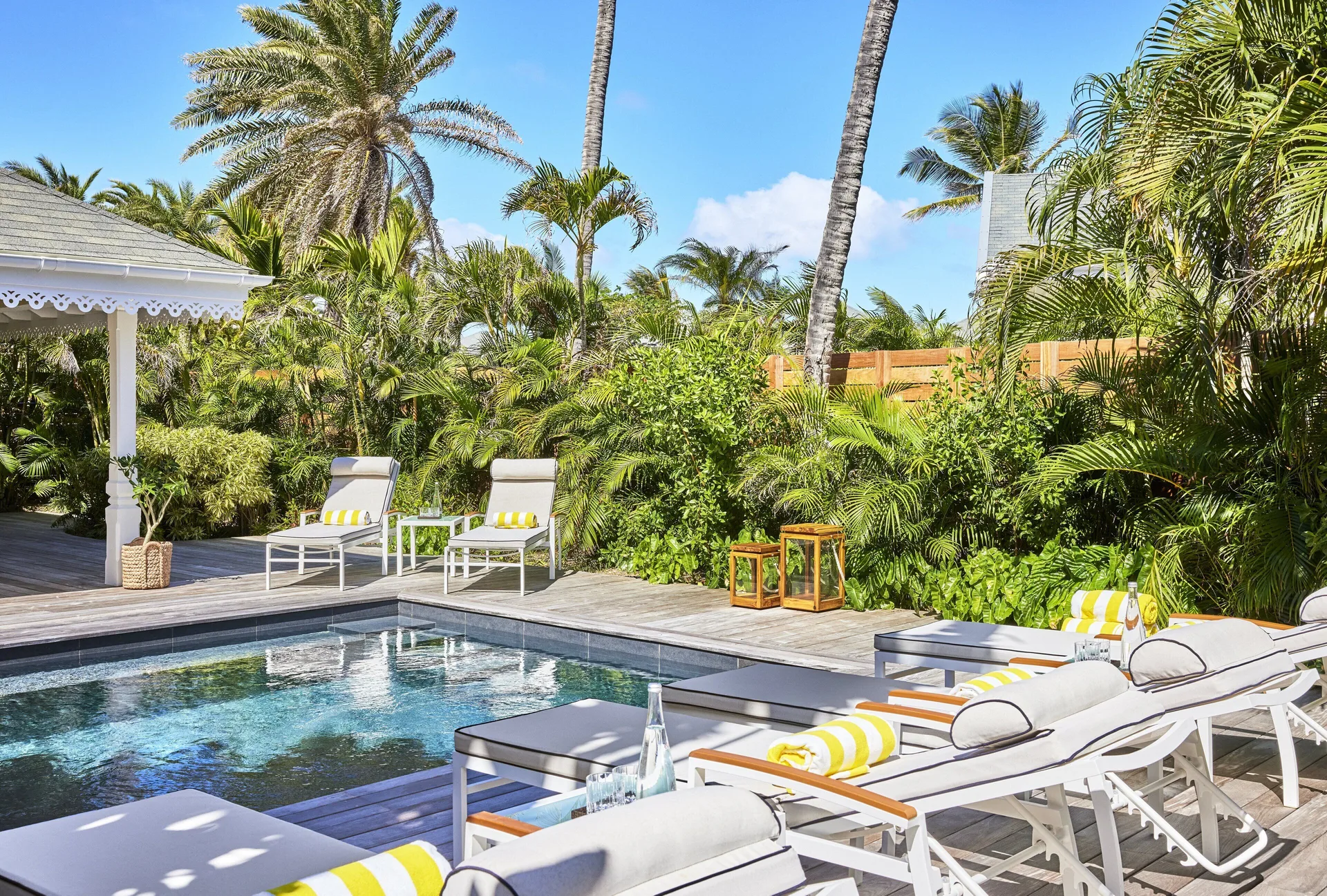 Garden House pool with loungers and tropical plants at Rosewood Le Guanahani St Barth.