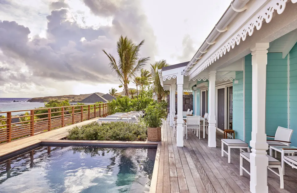 Marechal Suite terrace with pool and ocean beyond at Rosewood Le Guanahani St Barth.