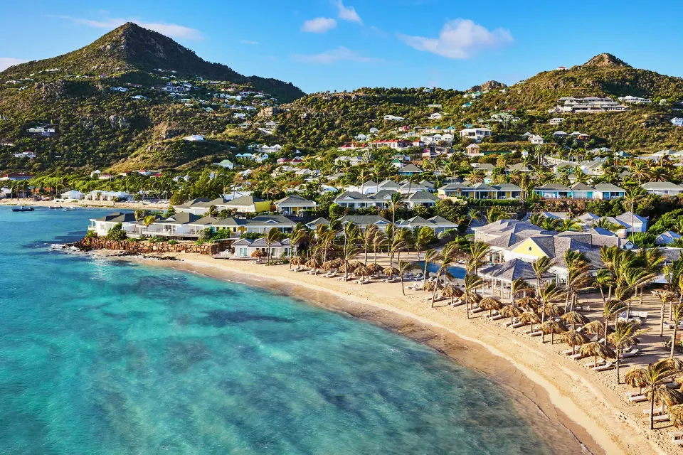 Ocean Bay Room coastal view of beach and hillside at Rosewood Le Guanahani St Barth.