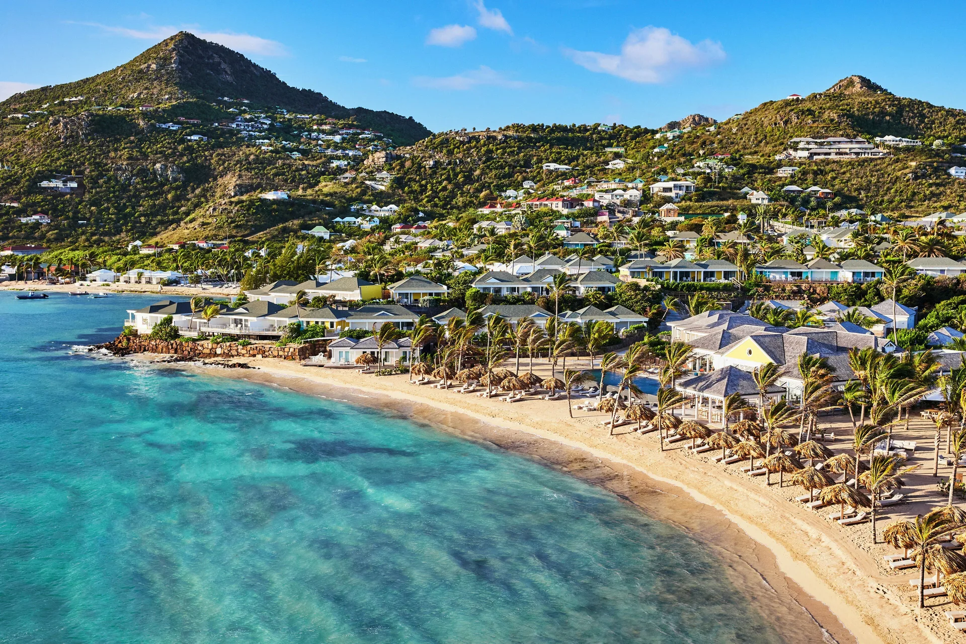Ocean Bay Room coastal view of beach and hillside at Rosewood Le Guanahani St Barth.