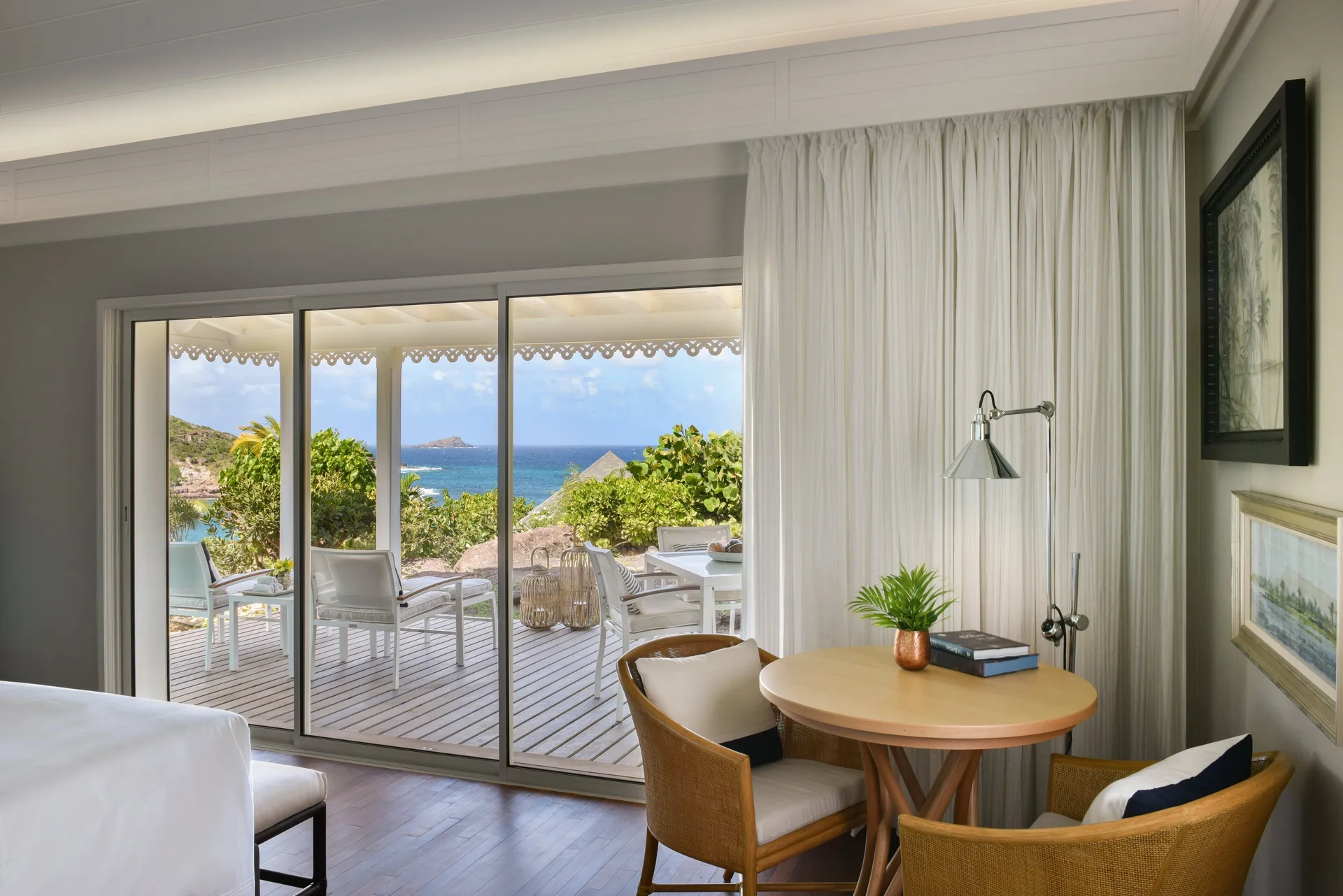 Ocean Bay Room sitting area and terrace ocean view at Rosewood Le Guanahani St Barth.