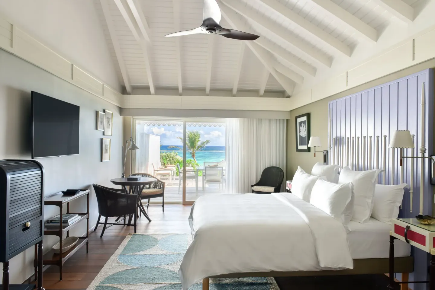 Ocean Cove Room king bed and terrace sea view at Rosewood Le Guanahani St Barth.