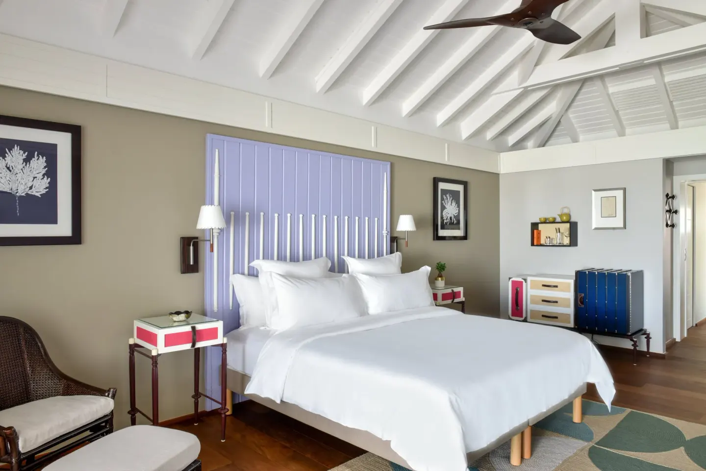 Ocean Cove Room king bed beneath a vaulted ceiling at Rosewood Le Guanahani St Barth.