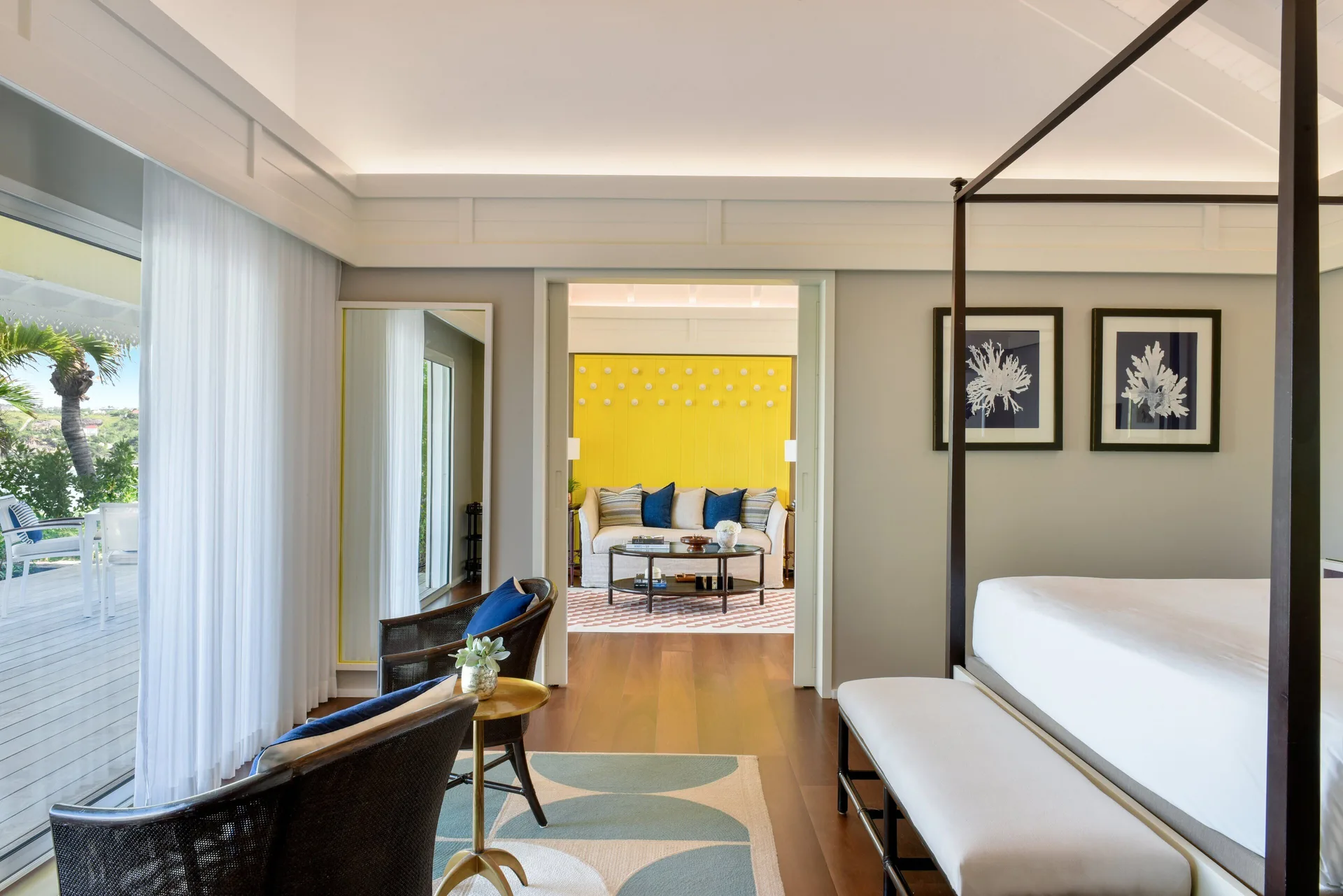 Ocean View Suite bedroom opening to the living room at Rosewood Le Guanahani St Barth.