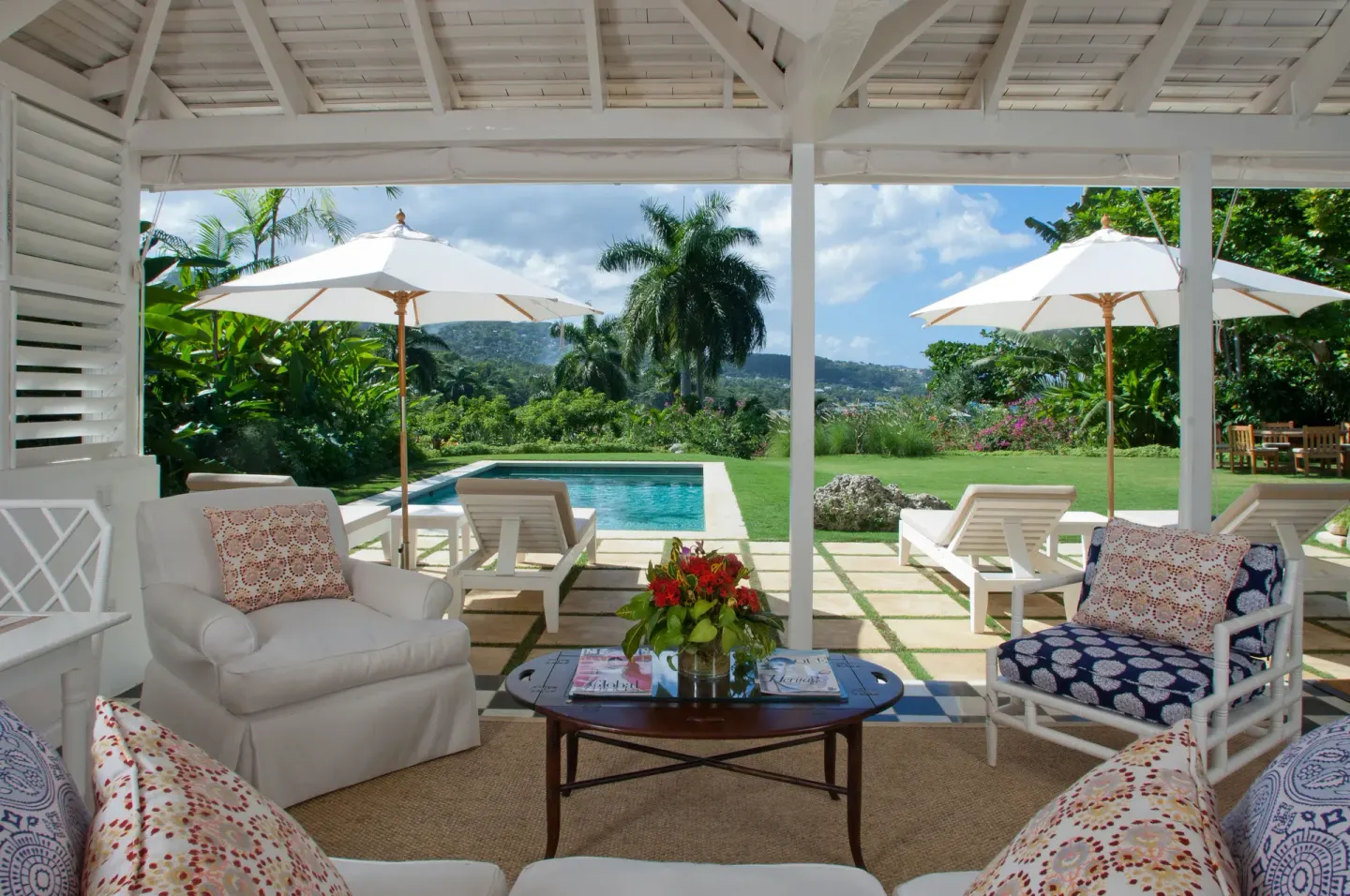 Covered villa lounge facing a private pool at Round Hill Hotel And Villas.
