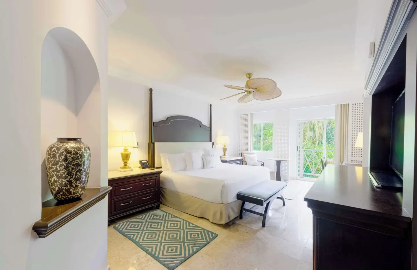 Luxury Royal Hideaway Playacar with king bed and balcony at Royal Hideaway Playacar.