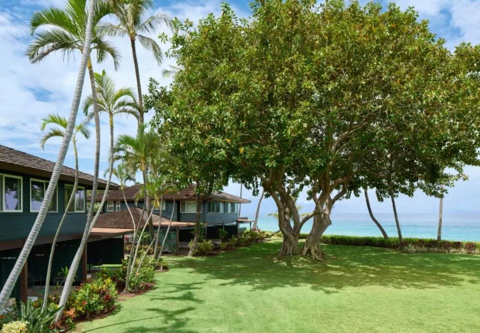 Oceanfront bungalow exterior and lawn at Royal Lahaina Resort & Bungalows.