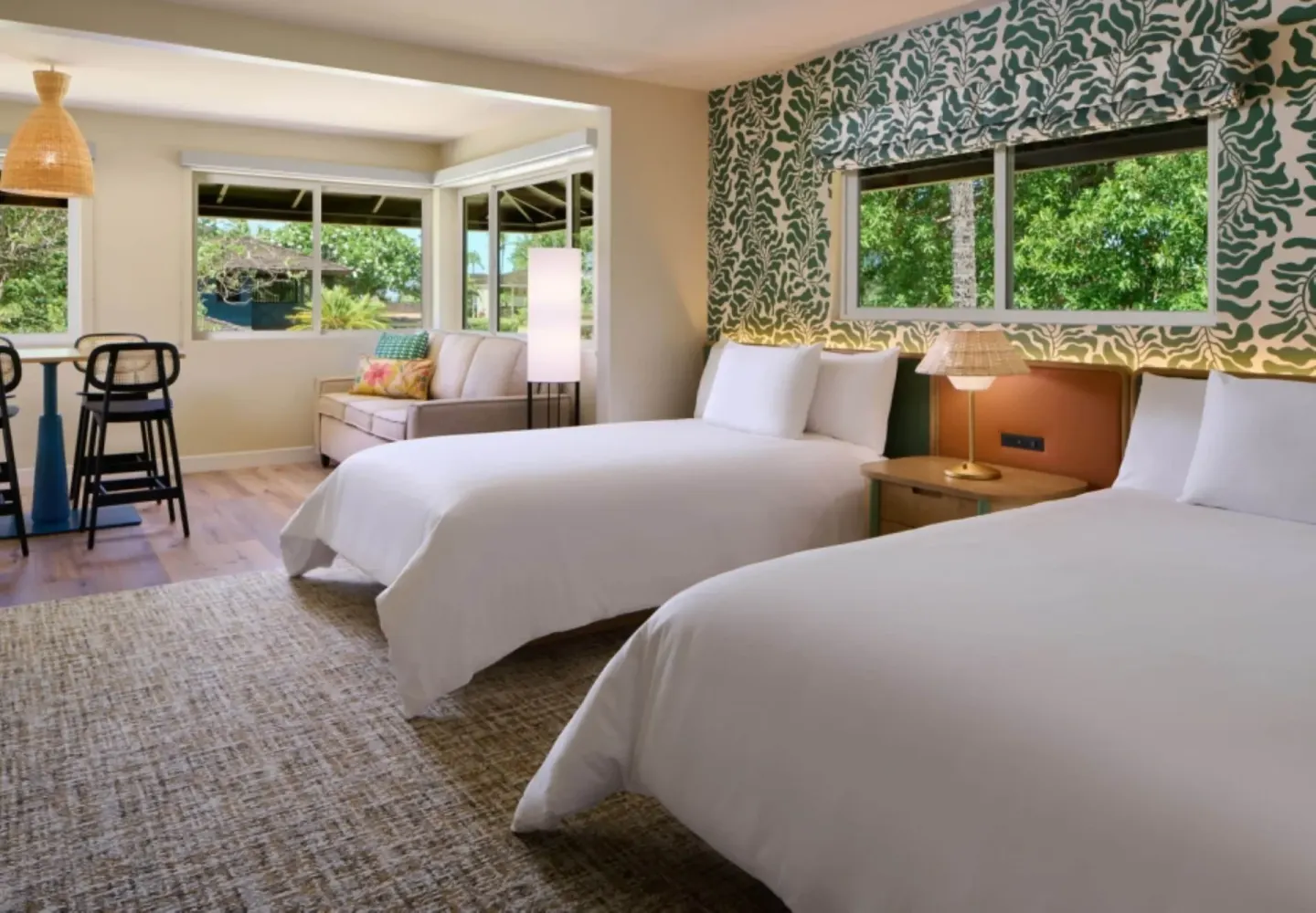 Two queen beds in a Bungalow Studio Suite with Kitchen at Royal Lahaina Resort & Bungalows.