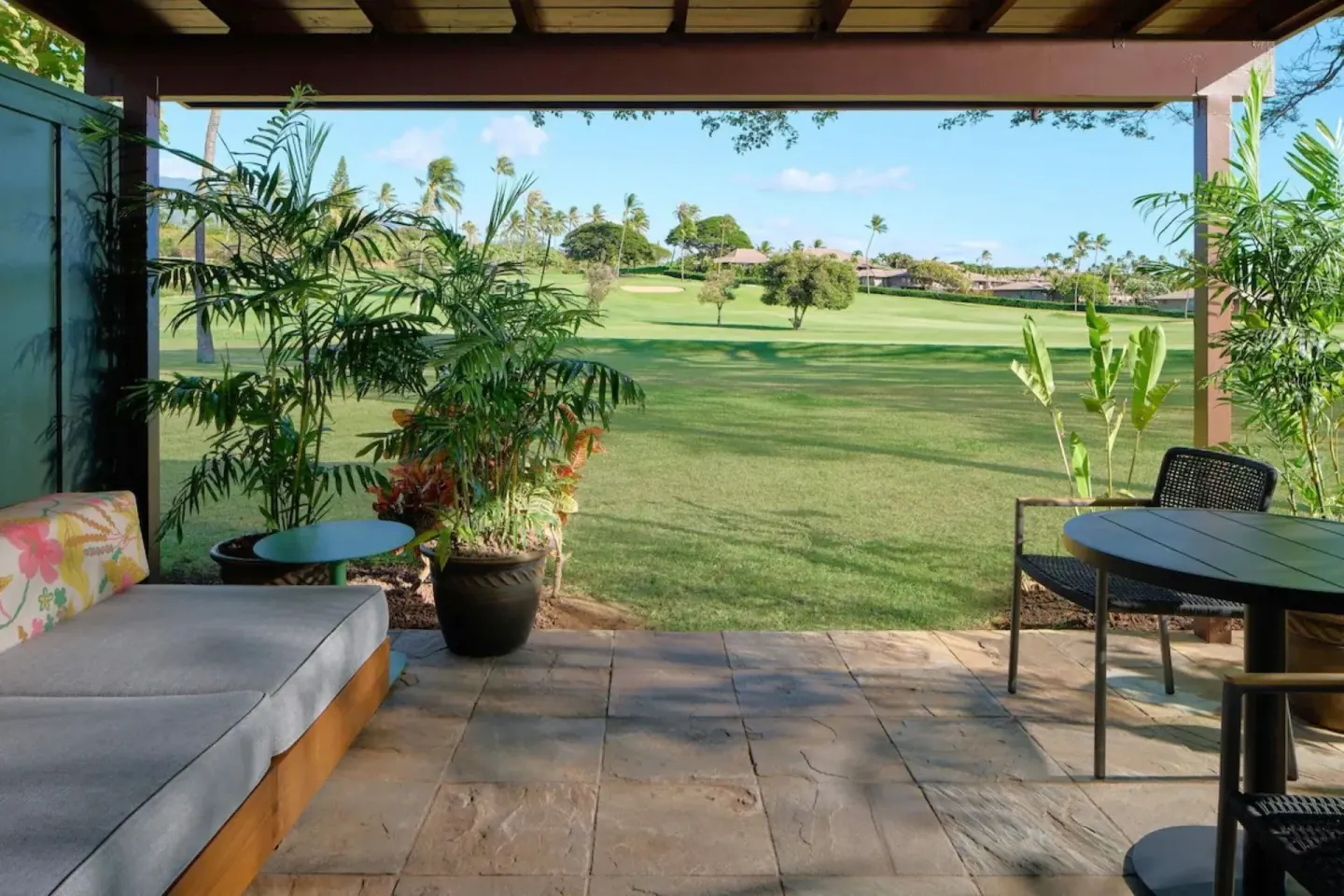 Bungalow Two lanai dining area overlooking lawn at Royal Lahaina Resort & Bungalows.