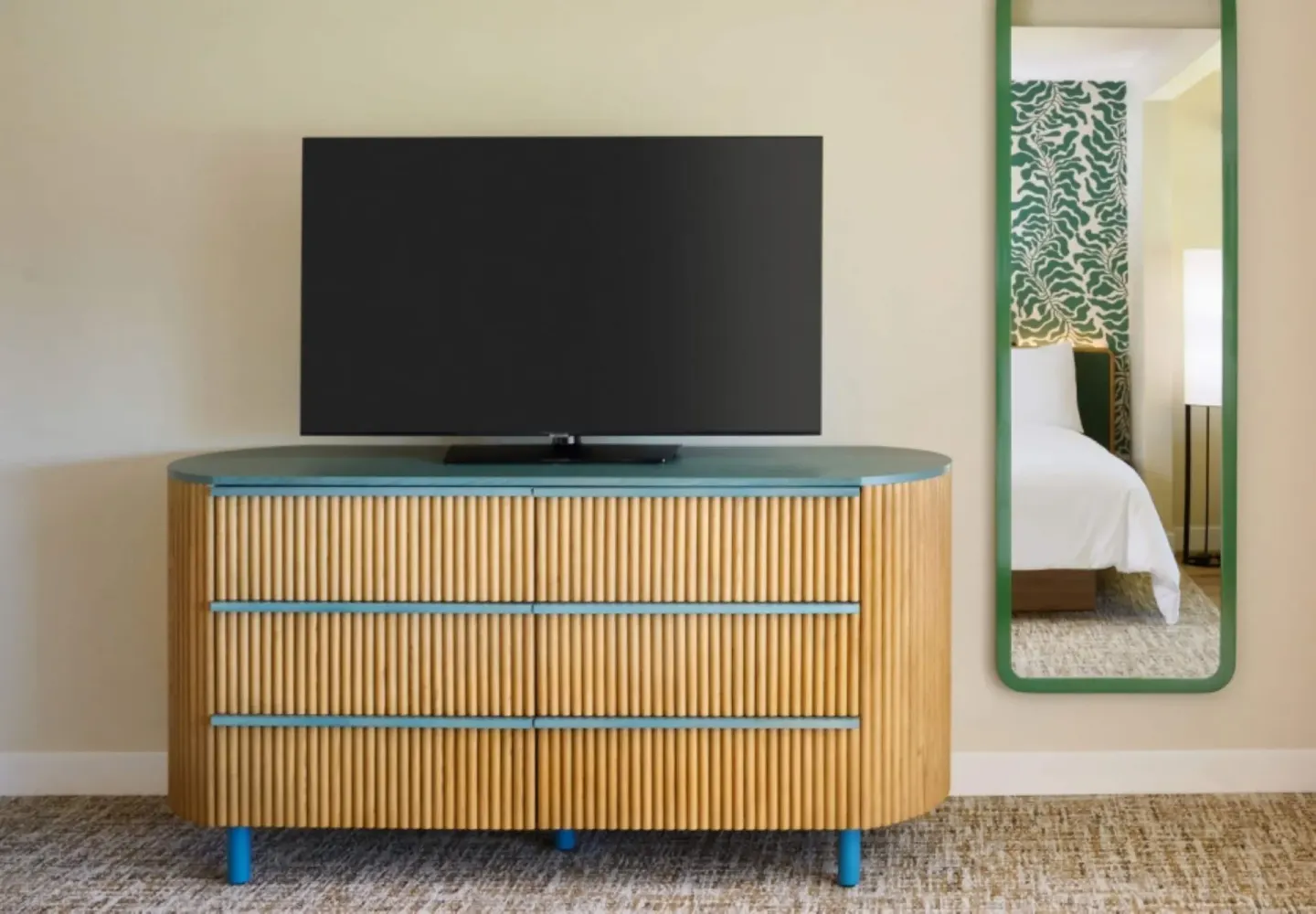 Bungalow Two dresser, TV, and mirror at Royal Lahaina Resort & Bungalows.