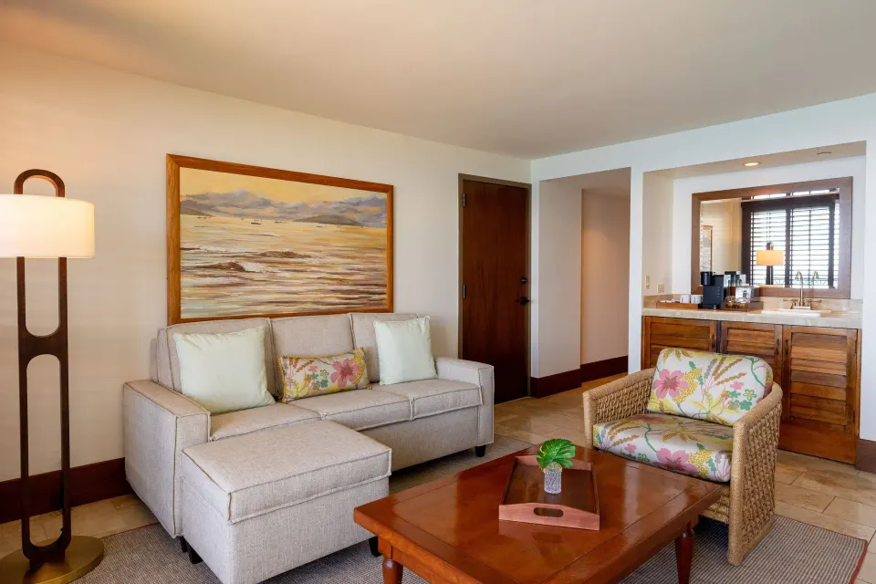 Living area of a Premier Ocean Front One-Bedroom Suite ADA at Royal Lahaina Resort & Bungalows.