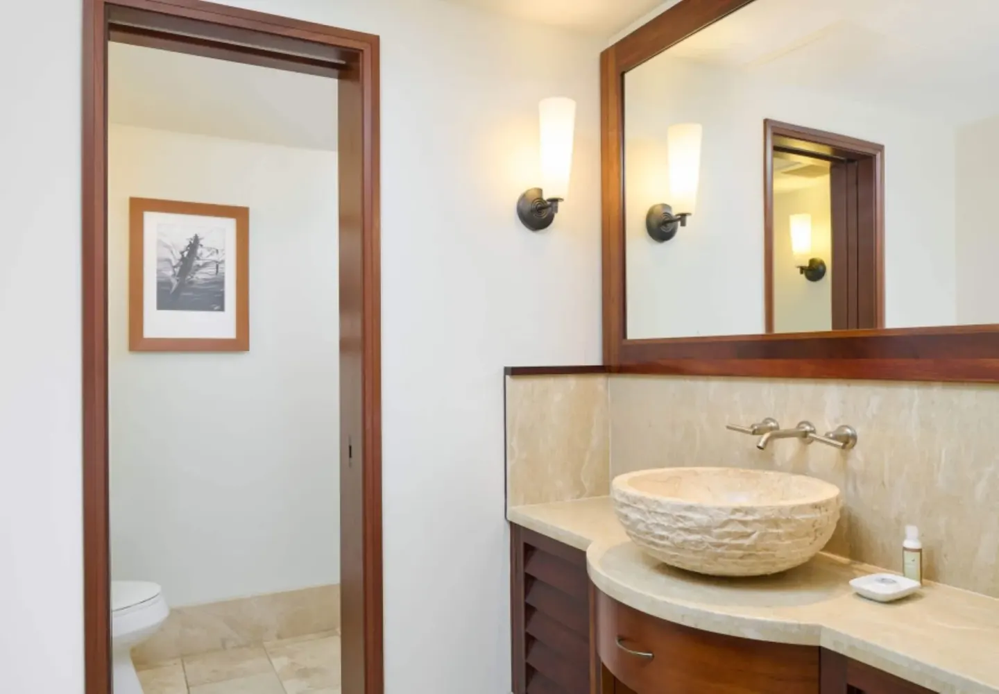 Stone vessel sink in the Premier Ocean Front One-Bedroom Suite bathroom at Royal Lahaina Resort & Bungalows.
