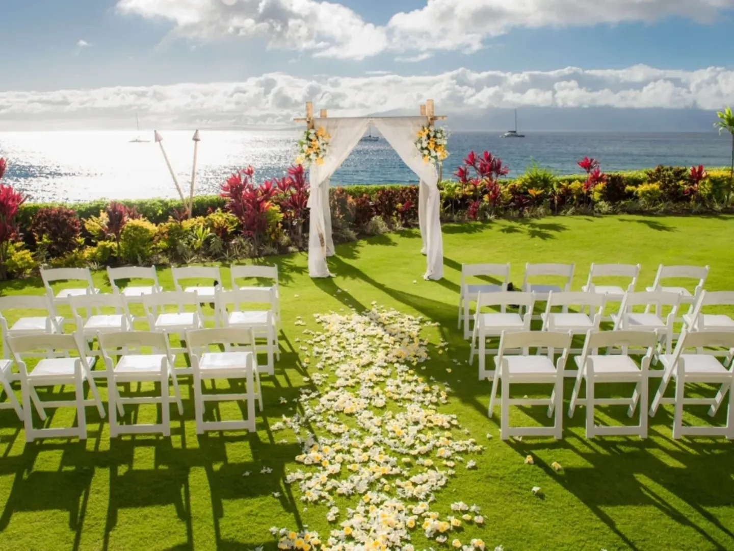 Oceanfront wedding ceremony setup on the lawn at Royal Lahaina Resort & Bungalows.