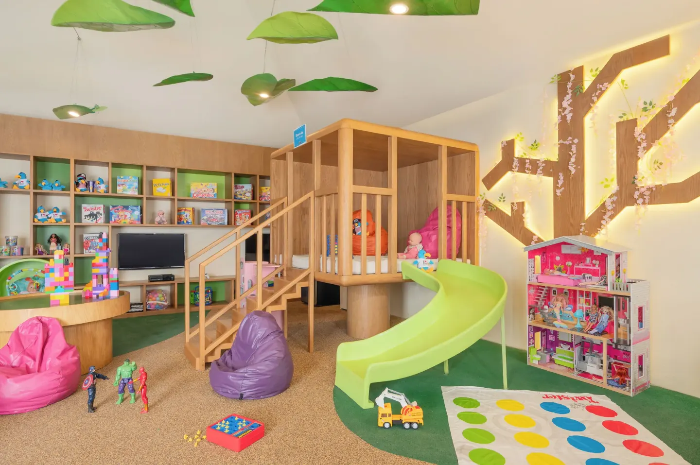 Children's playroom with slide, toys, and beanbags at Royal Solaris Cancun.