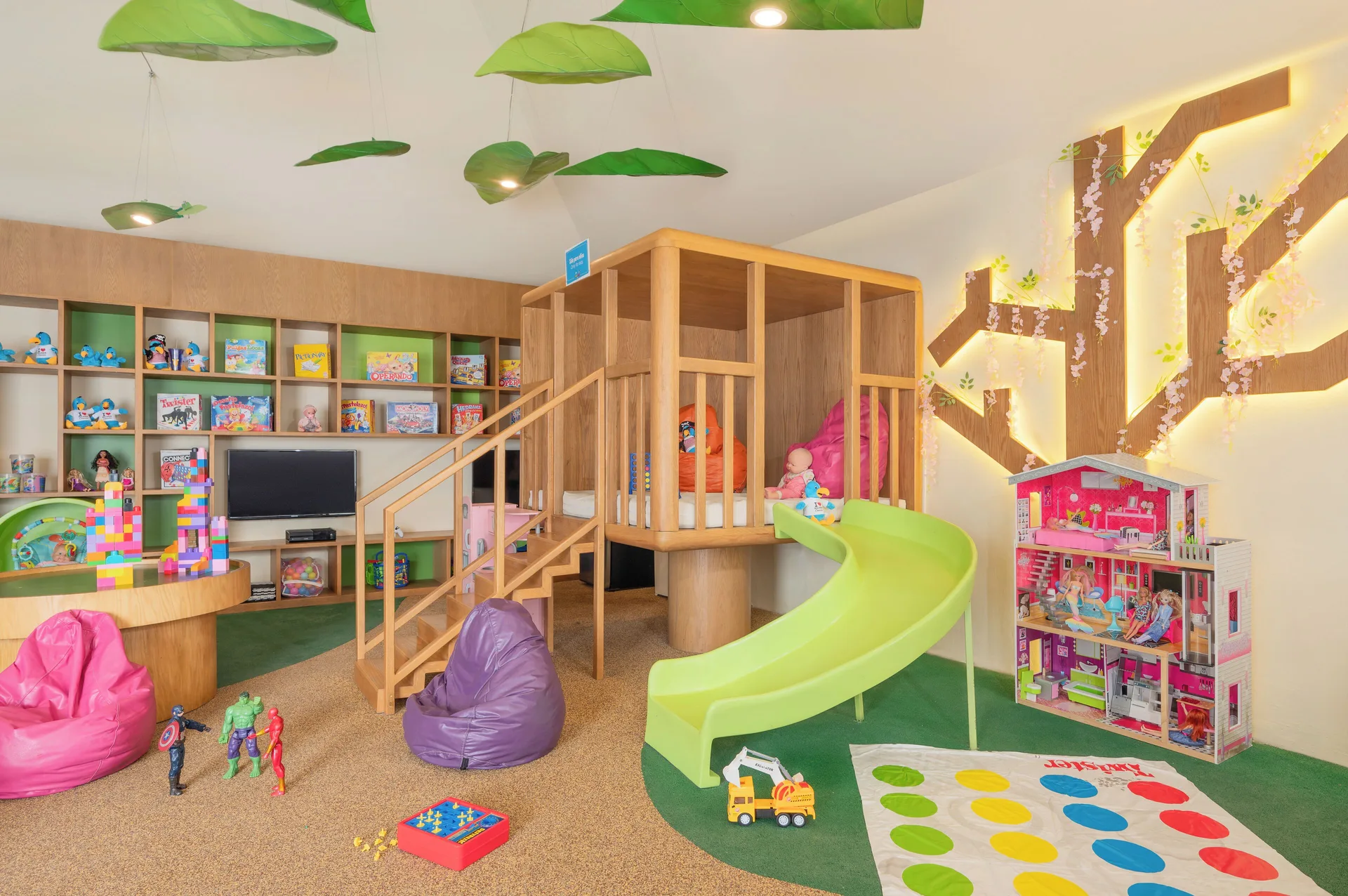 Children's playroom with slide, toys, and beanbags at Royal Solaris Cancun.