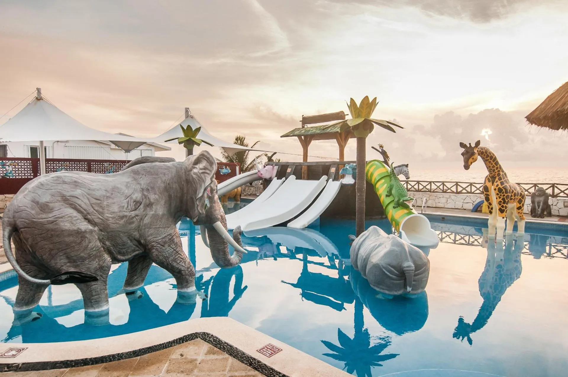 Kids' pool with animal figures and slides at Royal Solaris Cancun.