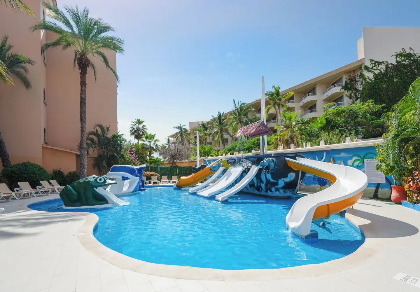 Children's pool with colorful slides and animal figures at Royal Solaris Los Cabos & Spa.