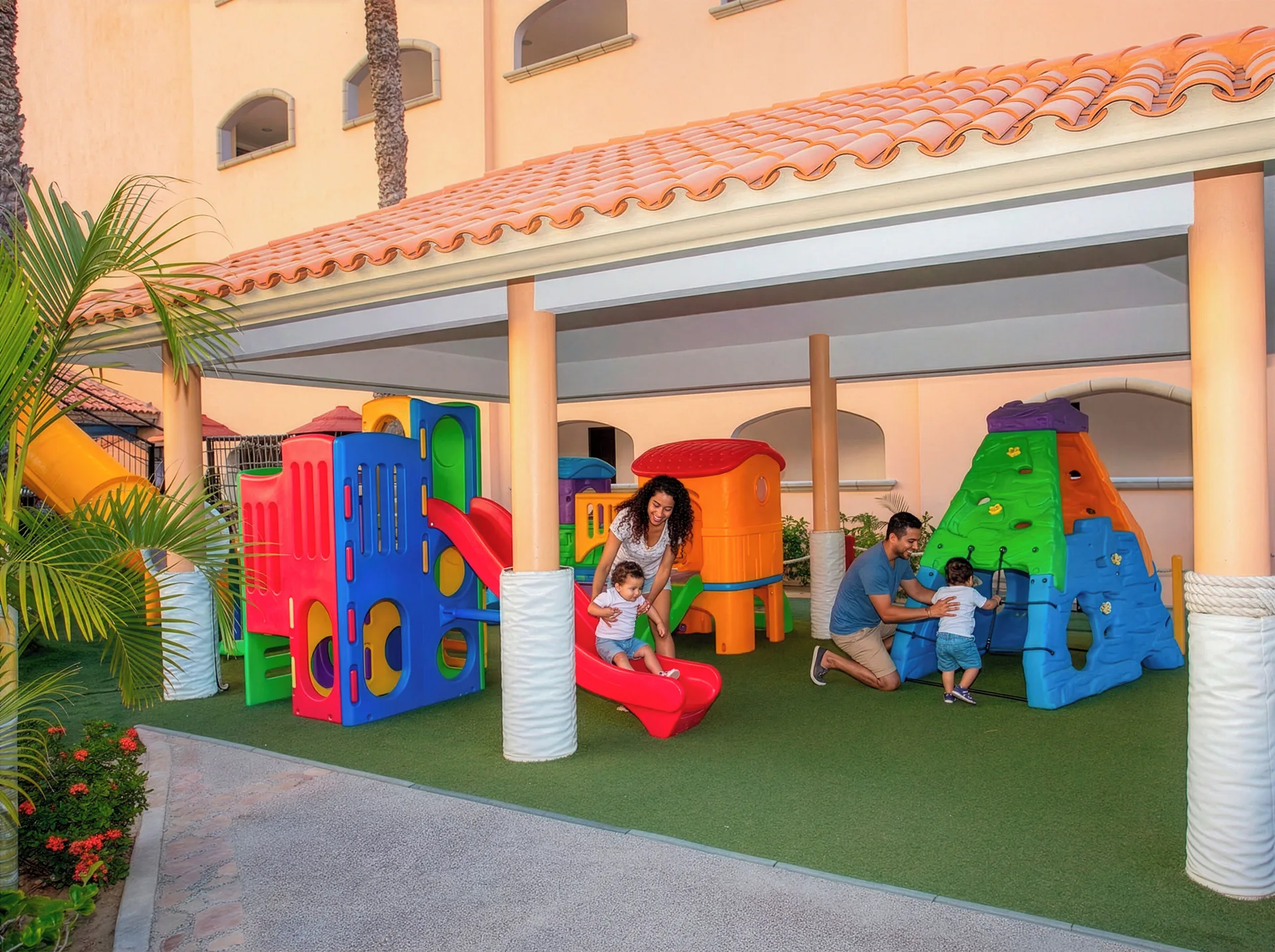 Covered children’s play area with slides at Royal Solaris Los Cabos & Spa.