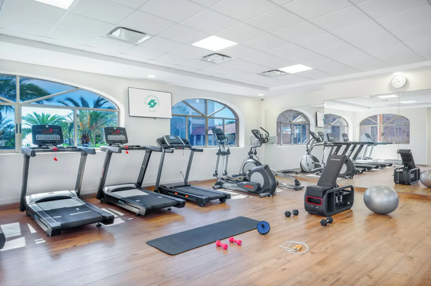 Fitness room with treadmills and exercise equipment at Royal Solaris Los Cabos & Spa.