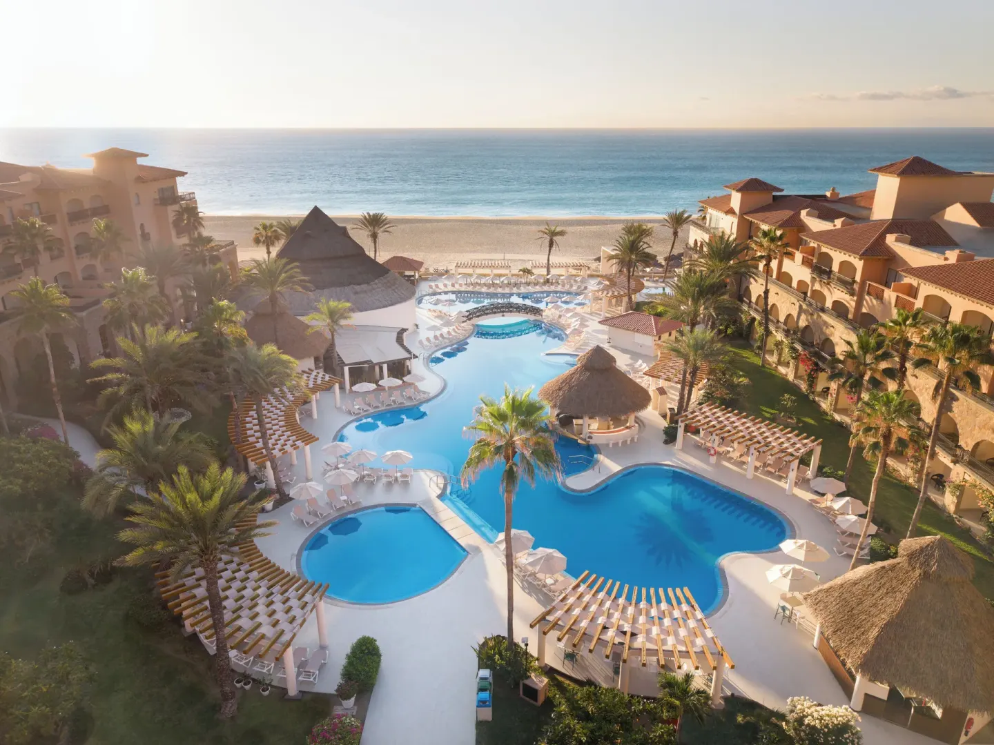 Oceanfront pool complex and beach at Royal Solaris Los Cabos & Spa.