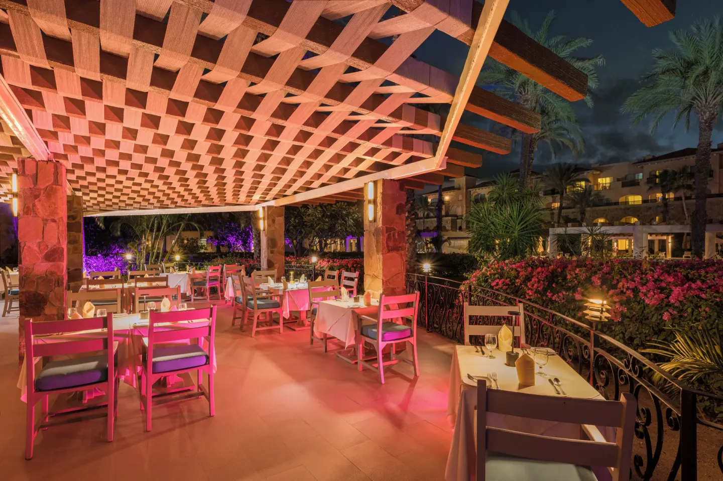 Outdoor terrace dining at night at Royal Solaris Los Cabos & Spa.