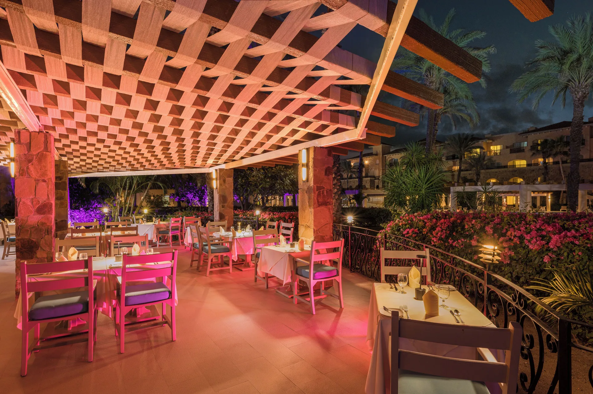 Outdoor terrace dining at night at Royal Solaris Los Cabos & Spa.