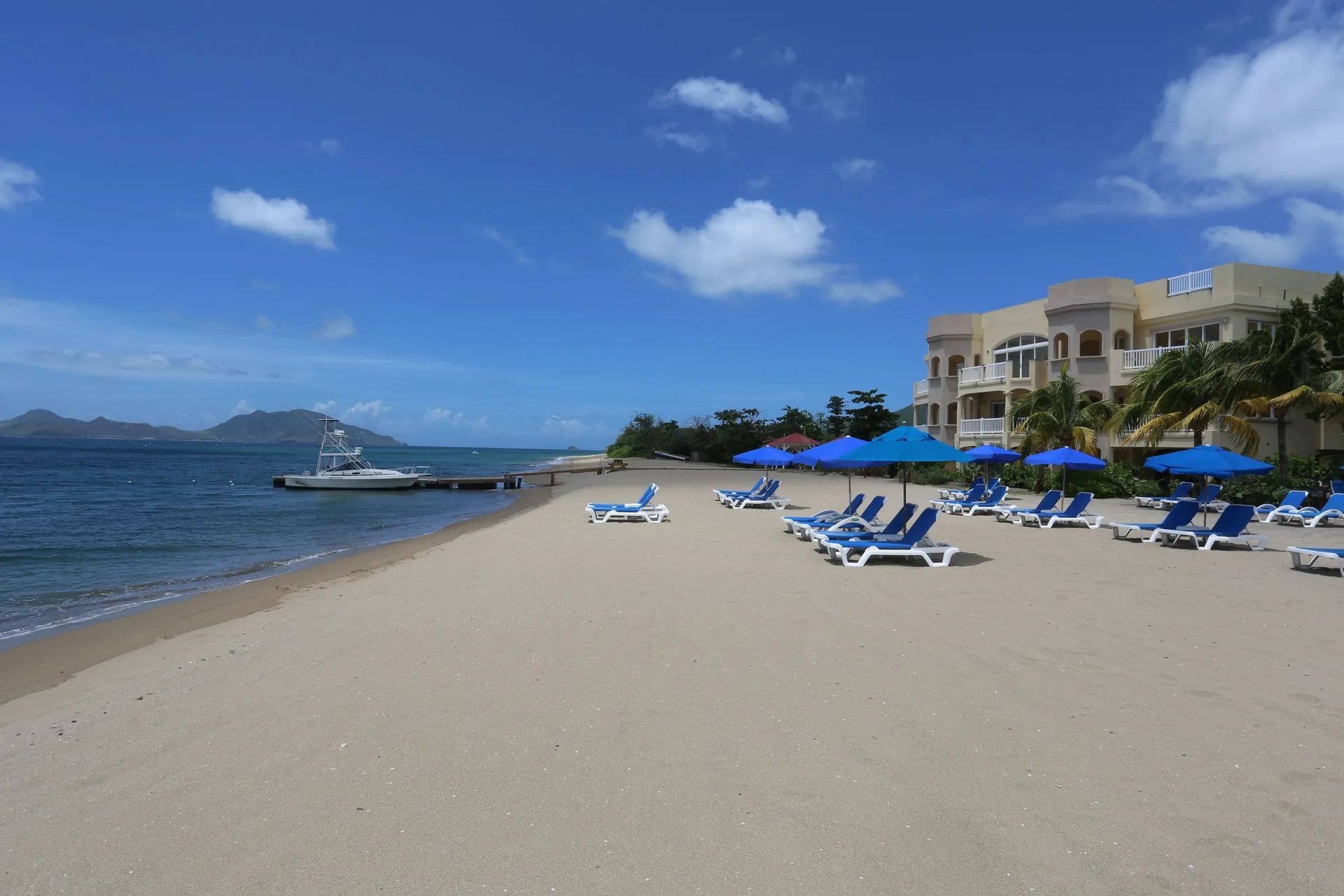 The Hamilton Beach Villas & Spa Nevis beachfront villa resort with spacious suites and pool