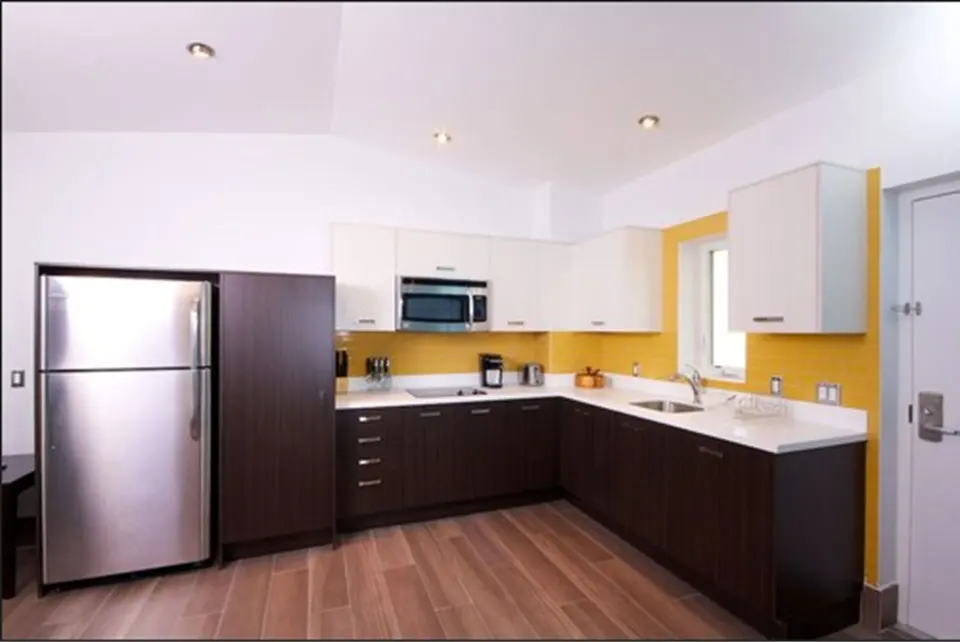Premium Apartment 1 Bedroom kitchen with full-size refrigerator at Royal St. Kitts Hotel.