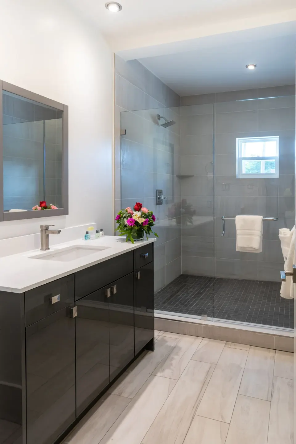 Superior Studio Poolside bathroom vanity and glass shower at Royal St. Kitts Hotel.
