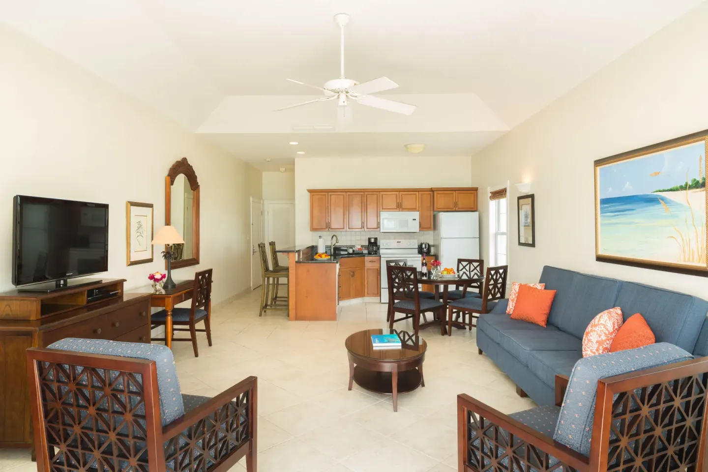 One-bedroom condo living area and kitchen at Royal West Indies Resort.