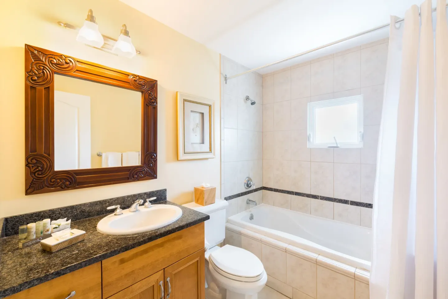 Studio Botanical View bathroom with tub and vanity at Royal West Indies Resort.