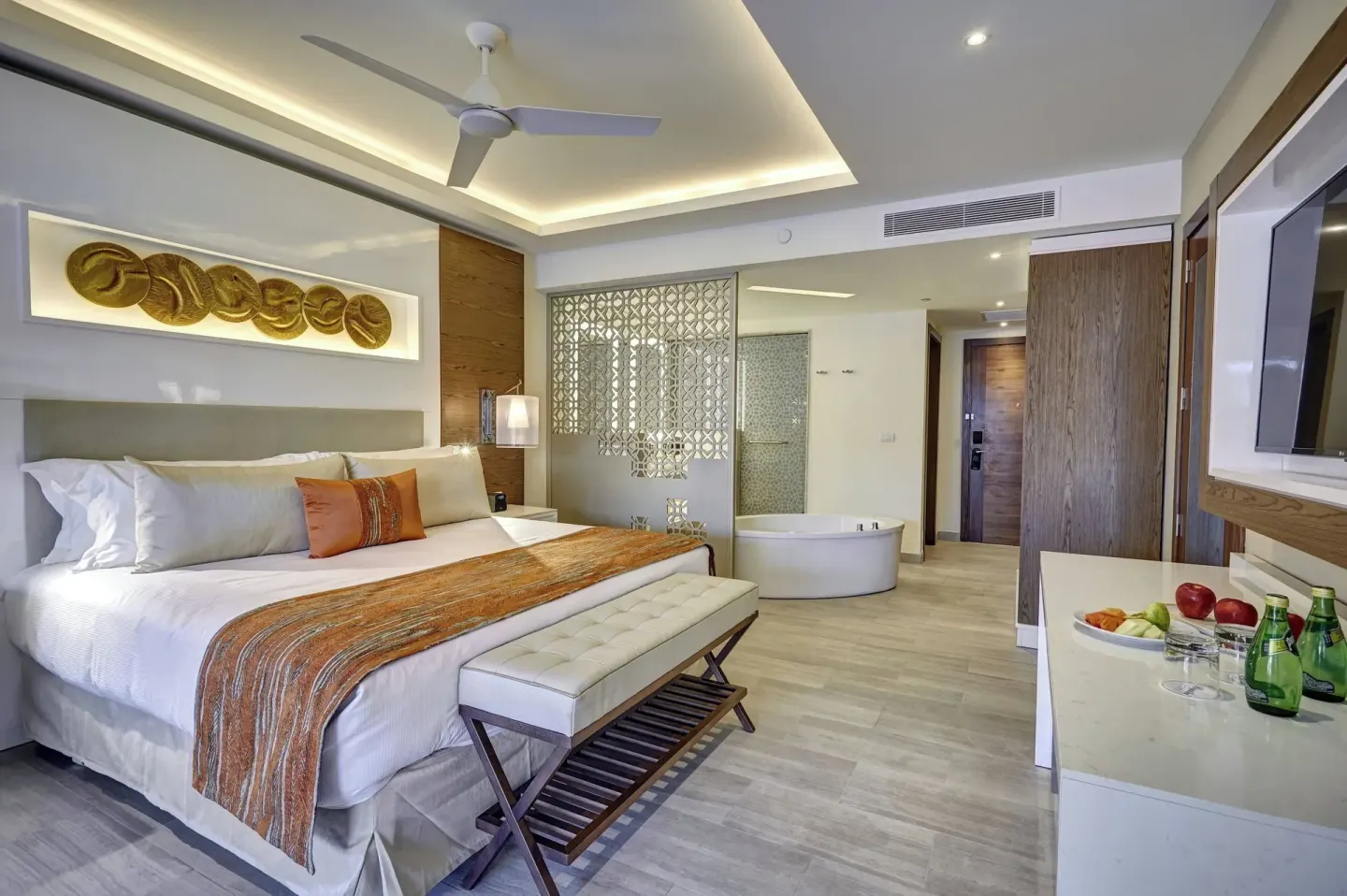 King bed suite with soaking tub area at Royalton Bavaro Resort & Casino.