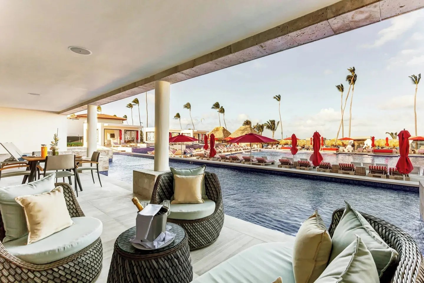 Covered swim-out terrace with lounge seating at Royalton Bavaro Resort & Casino.