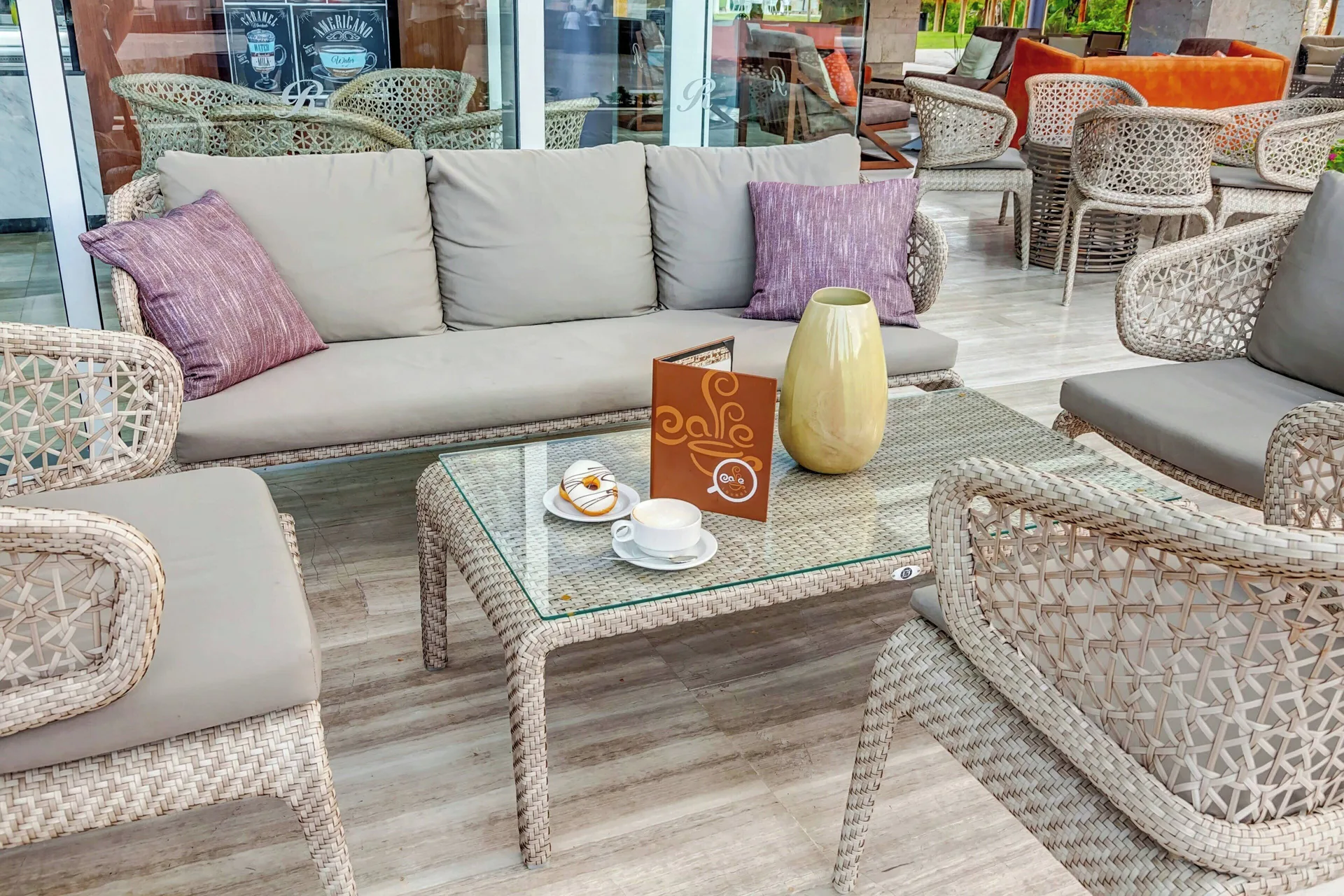 Cafe lounge seating with coffee and pastry at Royalton Bavaro Resort & Casino.