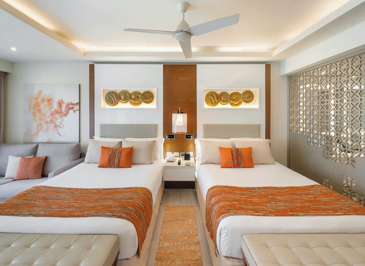 Two queen beds in a Luxury Junior Suite Ocean View Diamond Club at Royalton Bavaro Resort & Casino.