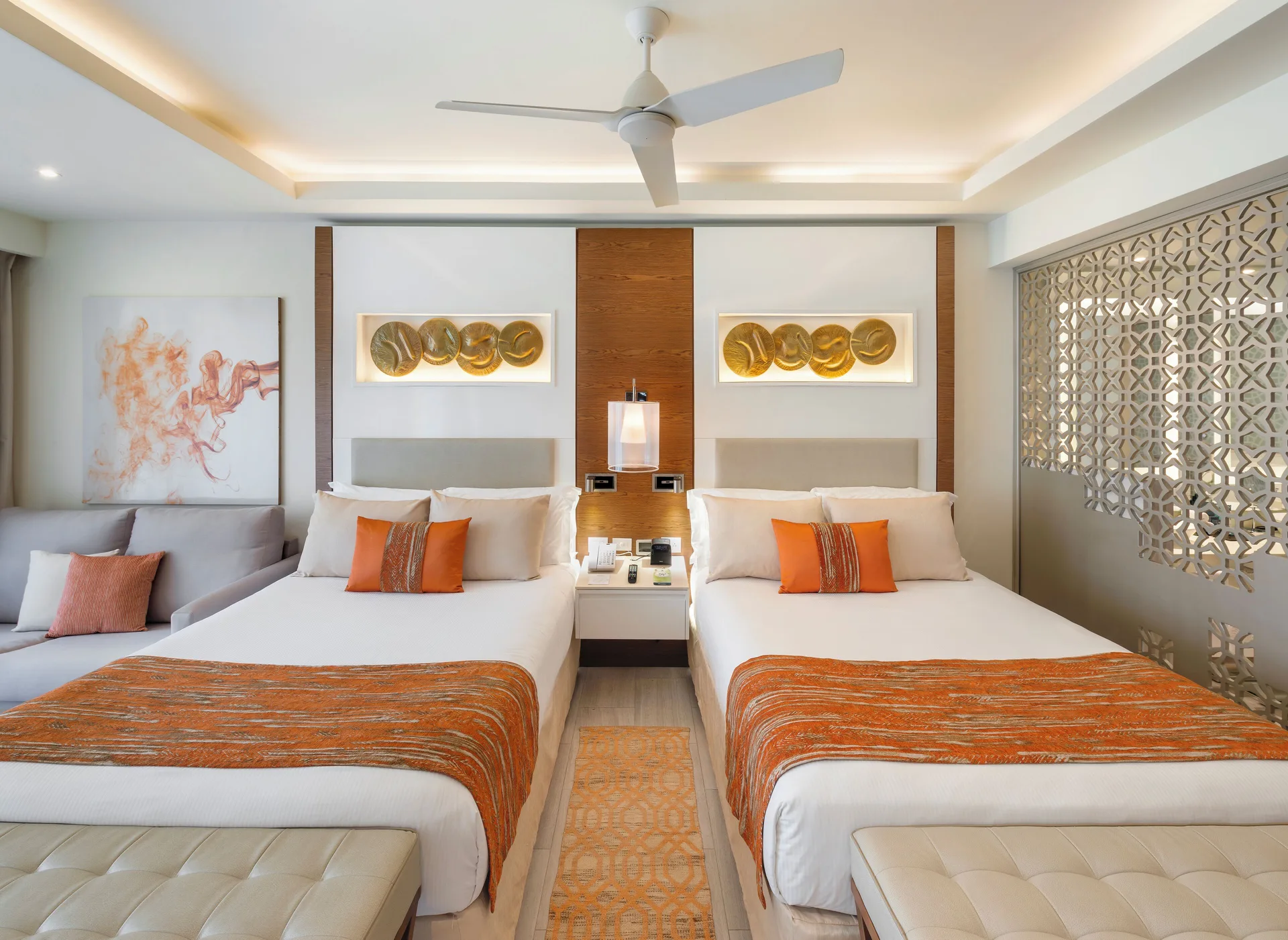 Two queen beds in a Luxury Junior Suite Ocean View Diamond Club at Royalton Bavaro Resort & Casino.