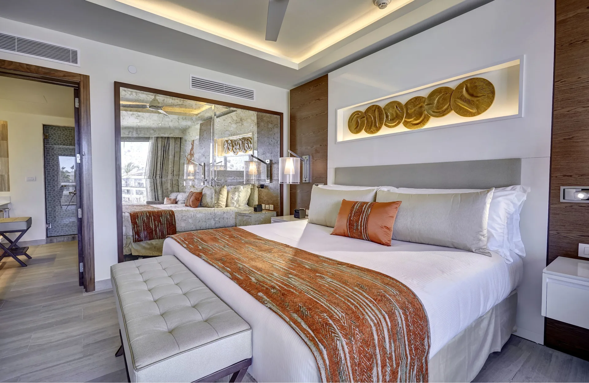 Luxury Presidential One Bedroom Suite king bed at Royalton Bavaro Resort & Casino.