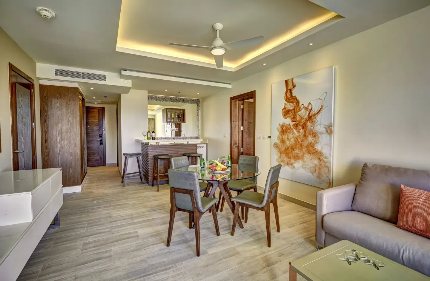 Luxury Presidential One Bedroom Suite living and dining area at Royalton Bavaro Resort & Casino.