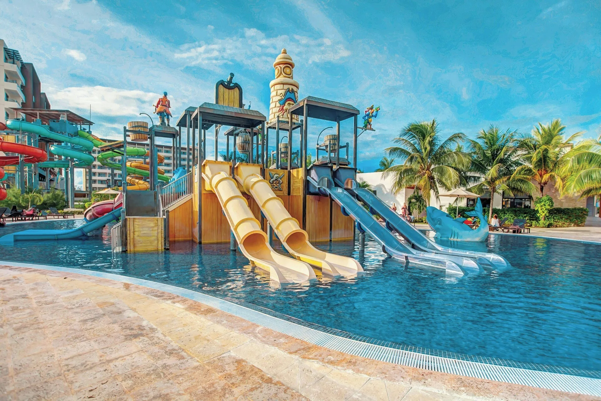 Children’s splash play structure with slides at Royalton Blue Waters Montego Bay.