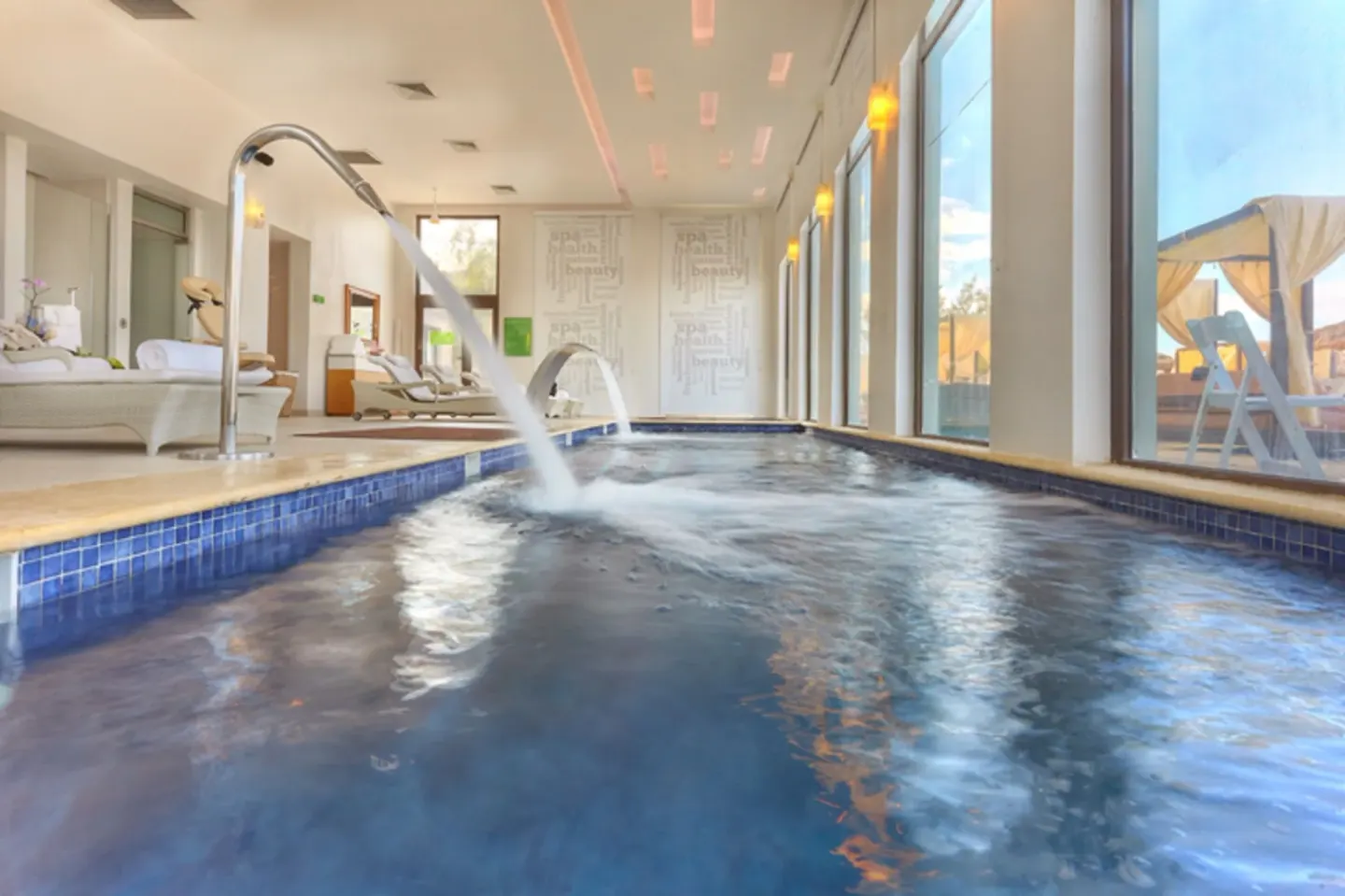 Indoor spa hydrotherapy pool with water jets at Royalton Blue Waters Montego Bay.