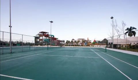 Tennis court near water slides at Royalton Blue Waters Montego Bay.