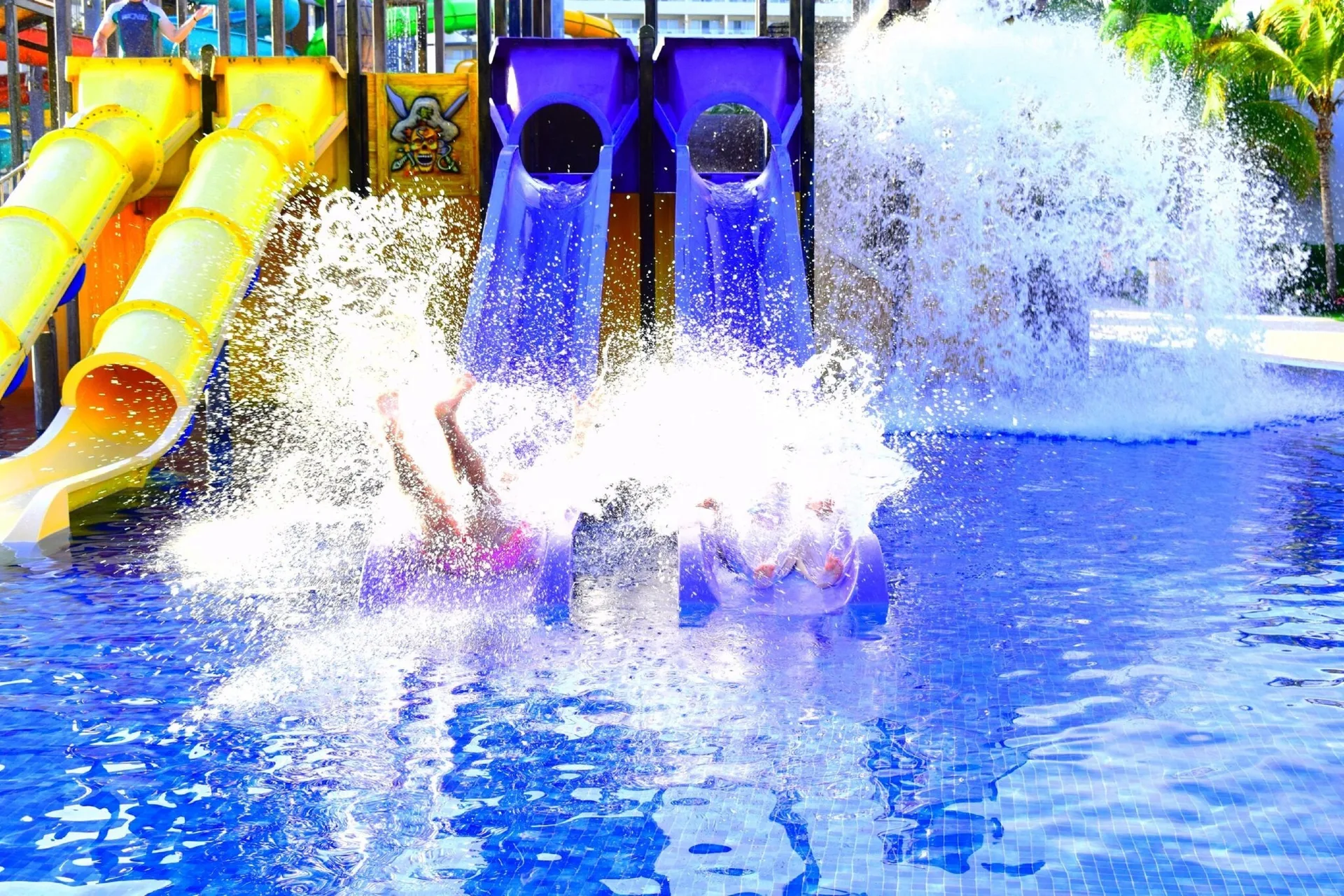 A large splash erupts at the water slides at Royalton Blue Waters Montego Bay.