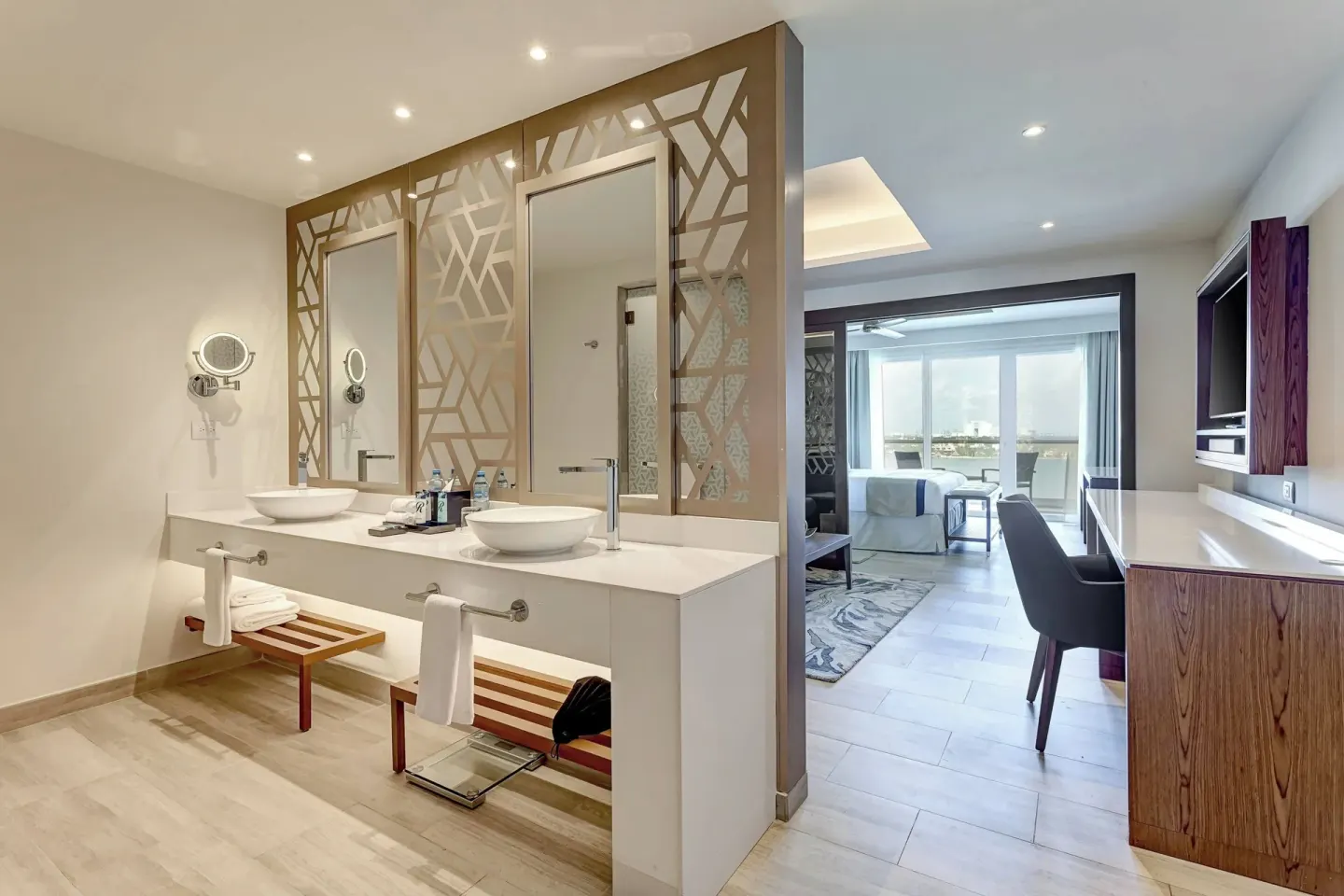 Suite double vanity and sleeping area at Royalton CHIC Cancun.