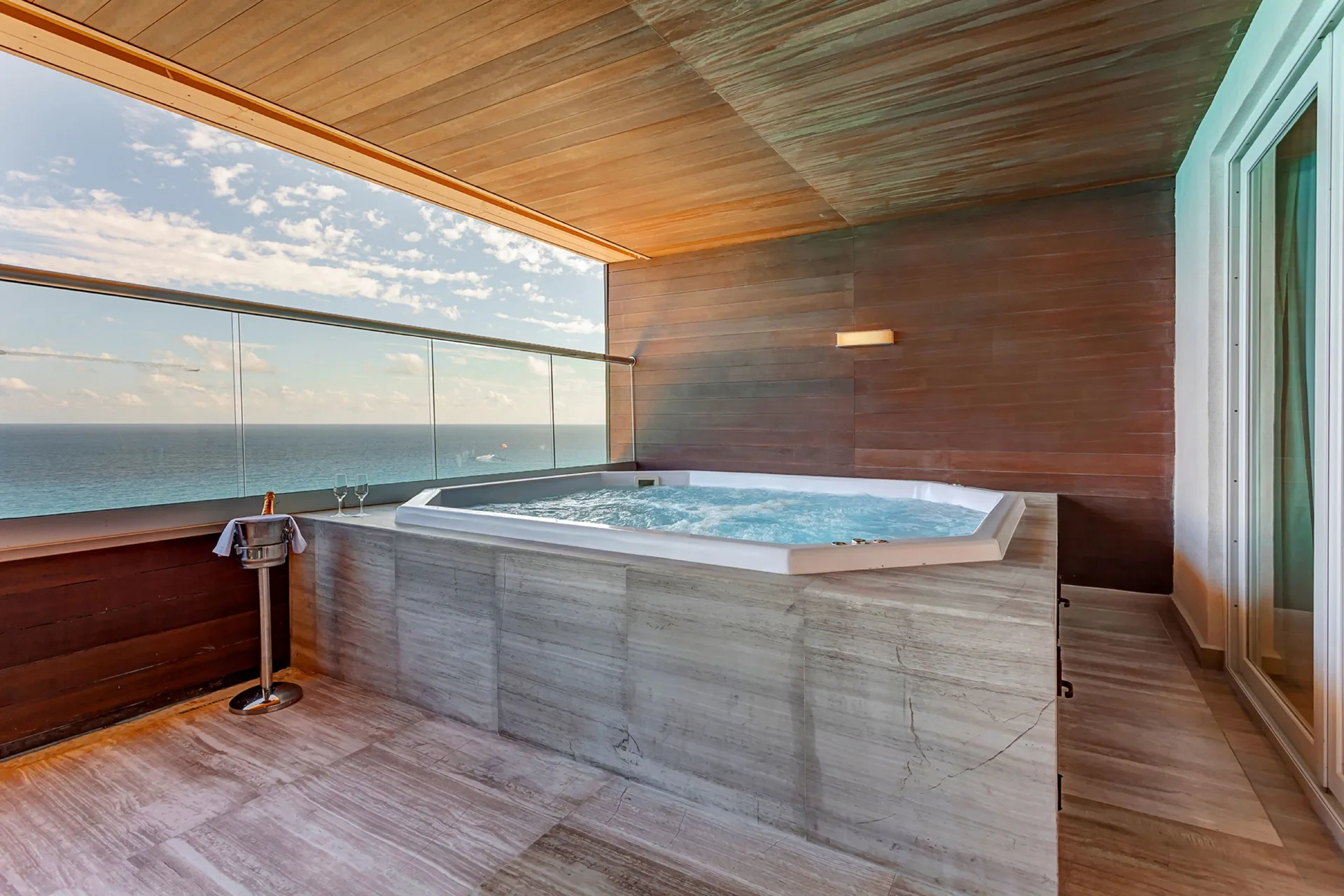 Terrace whirlpool with ocean view in a Chairman's suite at Royalton CHIC Cancun.