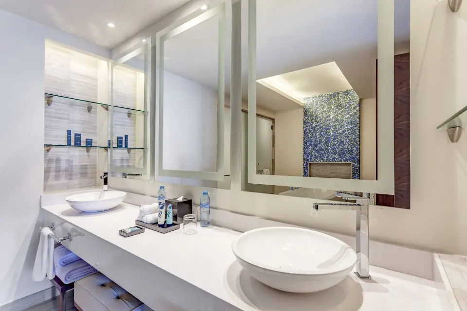 Double vanity bathroom in a presidential suite at Royalton CHIC Cancun.