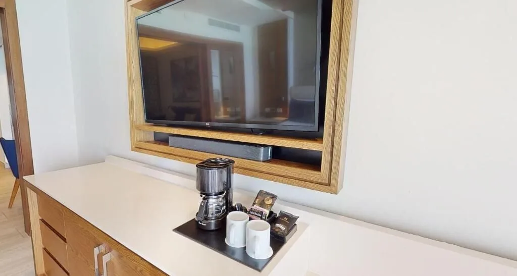 Luxury Suite Ocean Front TV and coffee station at Royalton CHIC Cancun.